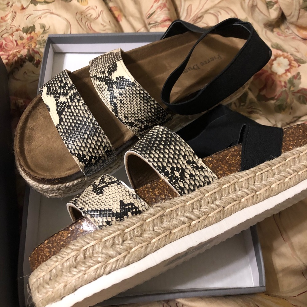 Sandals with a platform and ankle strap